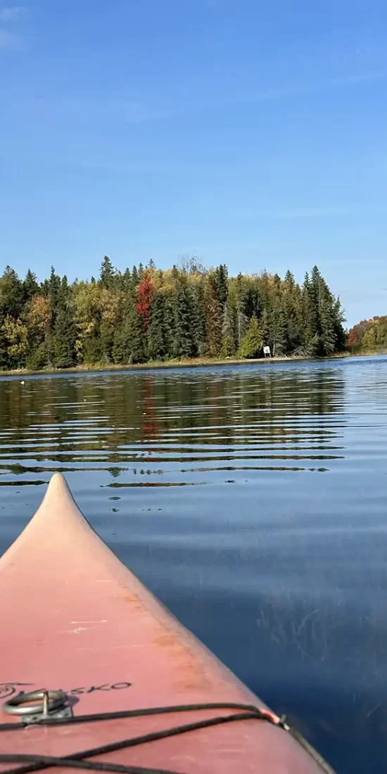 kayaking on island lake with cooking on camping stove